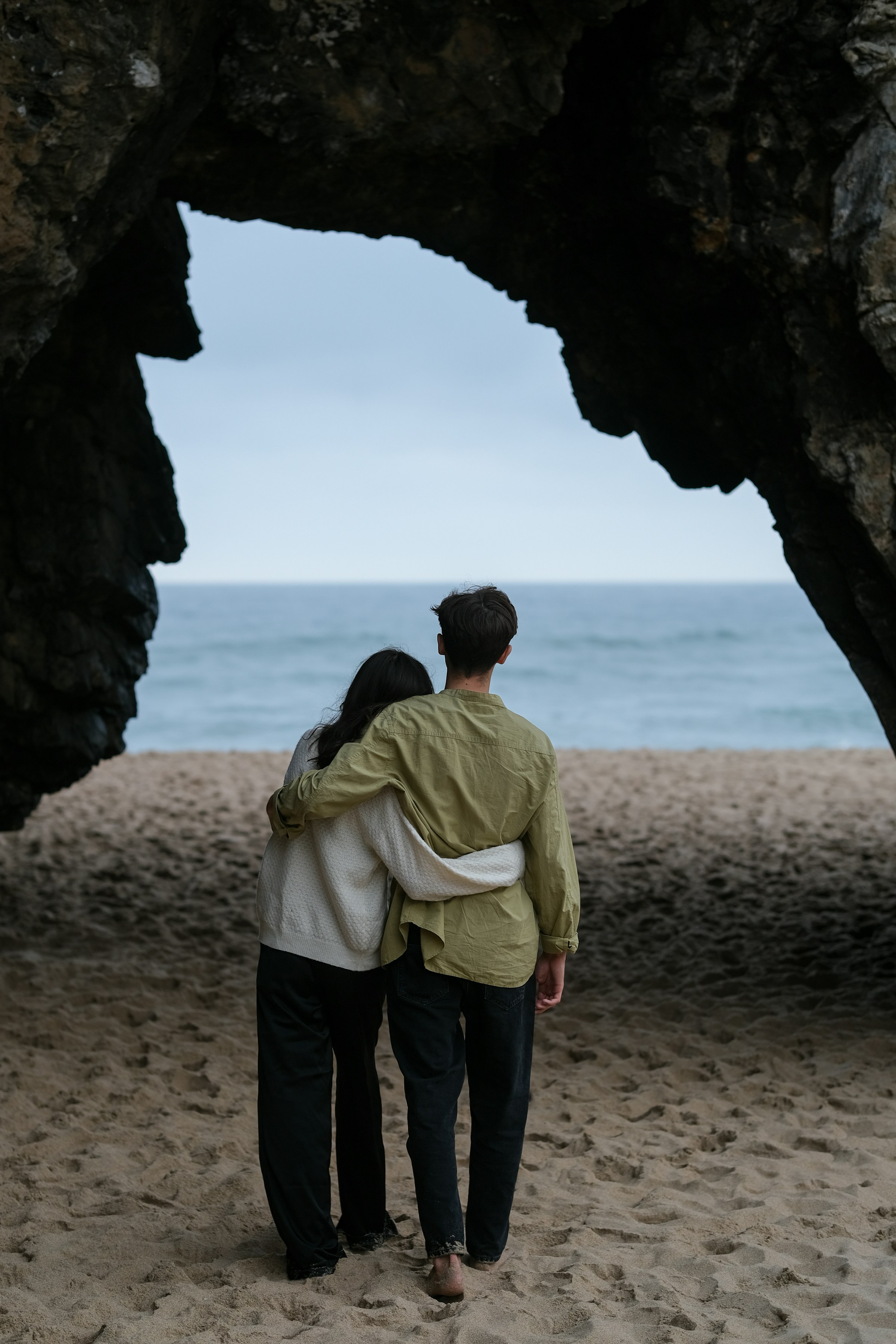 Couple embracing on beach